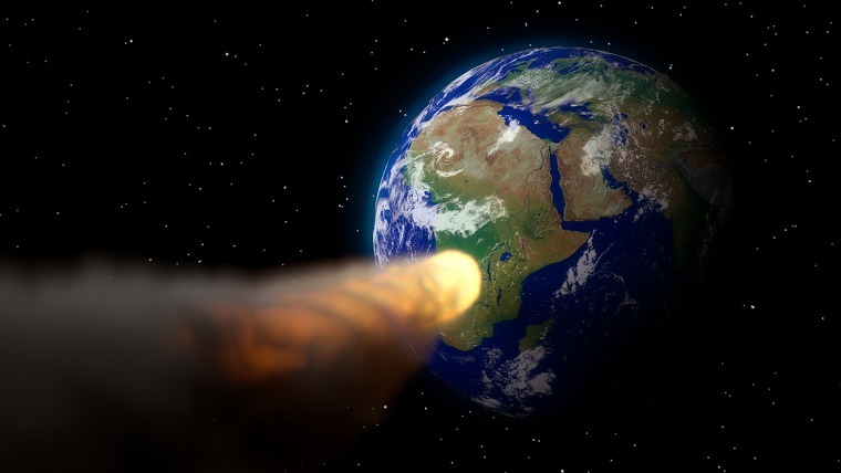 Imagen representativa de un asteroide acercándose a la Tierra